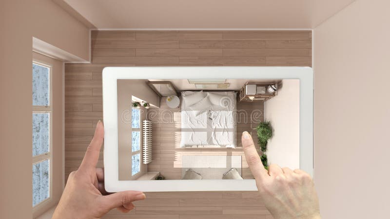 Conceito de realidade aumentada. Mão a segurar tablet com aplicação de RA utilizada para simular móveis e produtos de design num e imagem de stock royalty free