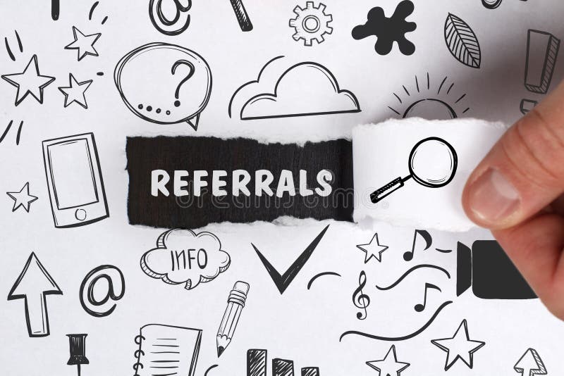 Business, Technology, Internet and network concept. Young businessman shows the word: Referrals. Business, Technology, Internet and network concept. Young businessman shows the word: Referrals