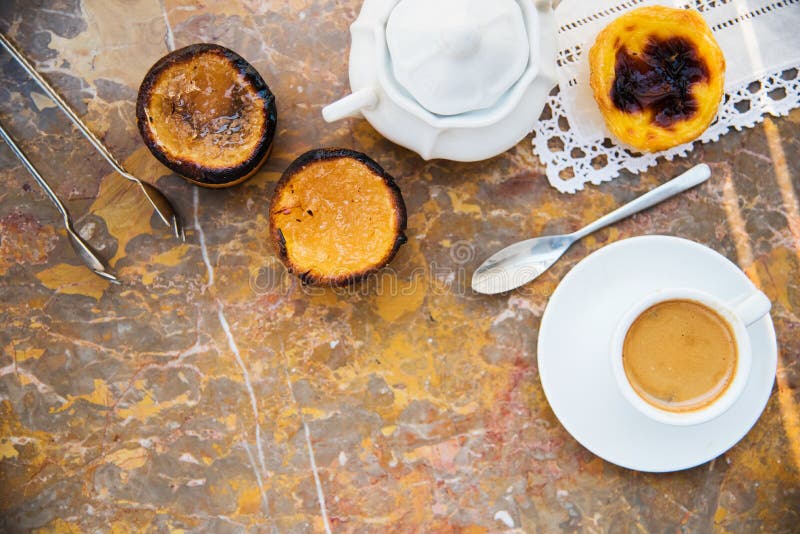 Conceived with the morning coffee and cakes (Pasteis de nata, typical pastry from Portugal) on natural marble surface.