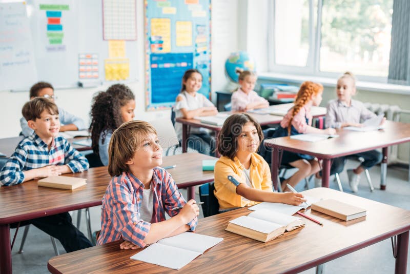 Concentrated Kids Listening Teacher Stock Photo Image of indoor