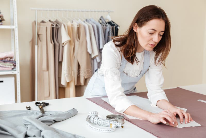 Concentrated Seamstress Making Patterns Stock Image - Image of ...