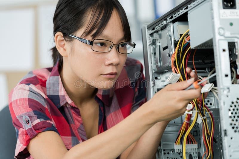 Concentrated Young Woman Working with Pc Cables Stock Photo Image of