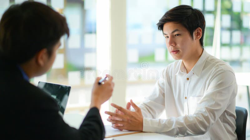 Concept of applying for work, Interviewing job seekers presenting their resume for executives to consider royalty free stock photography