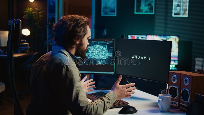 Programmer getting interrupted during work by AI becoming sentient, saluting and asking questions about itself. Concept of artificial intelligence becoming self aware, greeting man, camera B