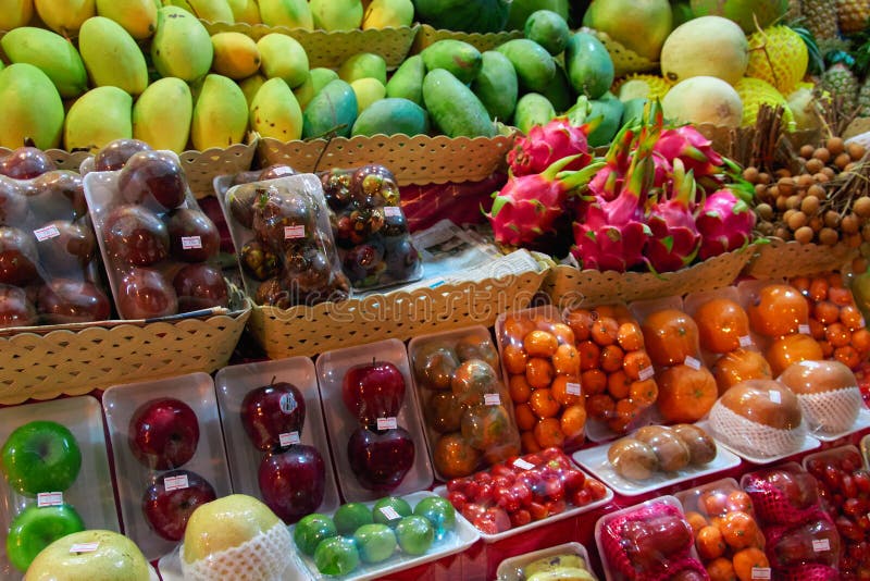 Concept asian food market street night vendor of fruits. Exotic tropical fruits. royalty free stock image Concept asian food market street night vendor of fruits. Exotic tropical fruits. royalty free stock image