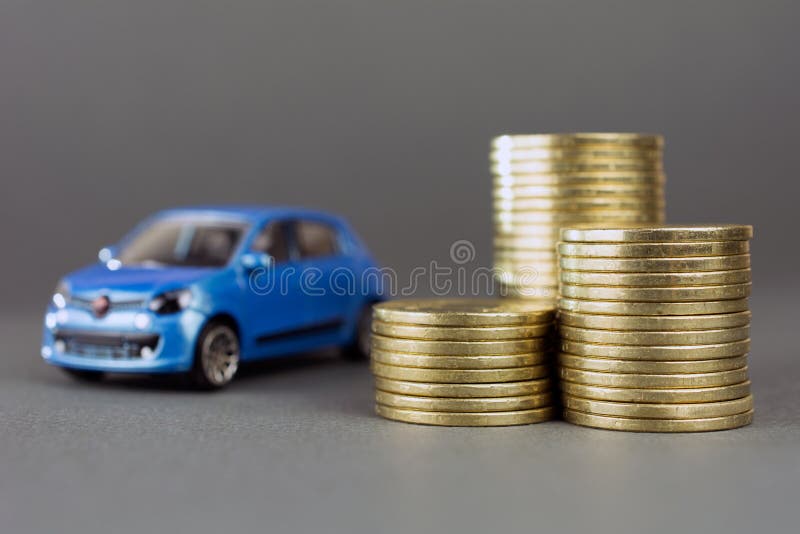 Toy car stack of coins stock photos Toy car stack of coins stock photos