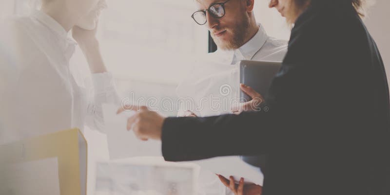 Concept of business team at working process.Young professionals work with new market startup. Project managers meeting stock images Concept of business team at working process.Young professionals work with new market startup. Project managers meeting stock images