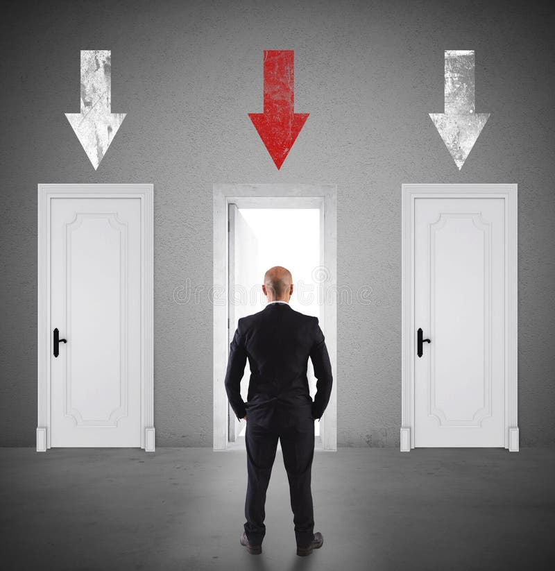 Concept of businessman choosing the right door royalty free stock photo Concept of businessman choosing the right door royalty free stock photo