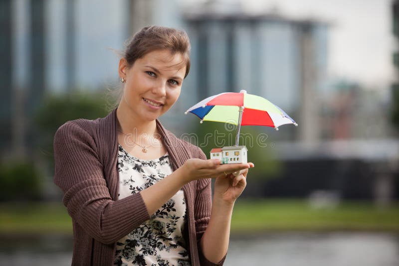 Concept of Buying and Insuring Real Estate. Stock Photo Image of girl