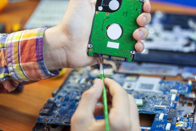 The concept of computer hardware, mobile phone, electronic, repairing, upgrade and technology stock photo