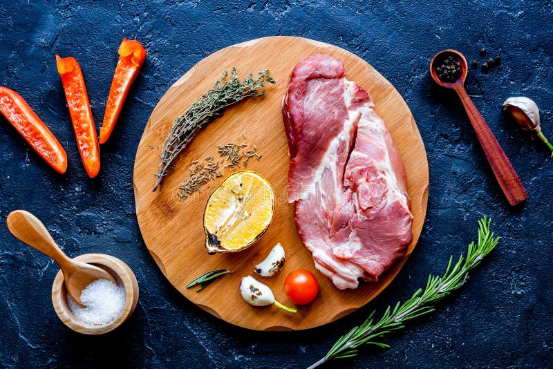 Concept Cooking Meat Steak on Dark Background Top View Stock Photo