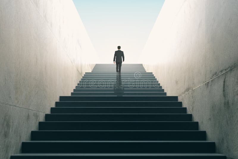 Concept d'ambitions avec les escaliers s'élevants d'homme d'affaires