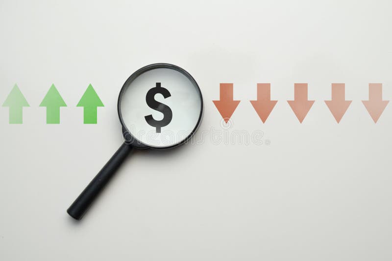 Dollar growth and fall rate research concept - abstract dollar sign in a loop near the arrows. Close up. Dollar growth and fall rate research concept - abstract dollar sign in a loop near the arrows. Close up