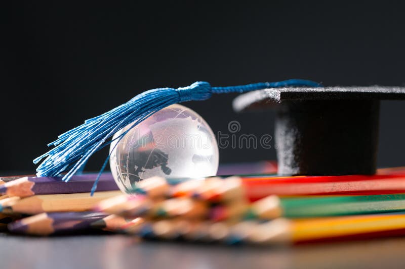 Concept education is business scholarship essential idea globalization, mortarboard students learn and study in universities and stock photography