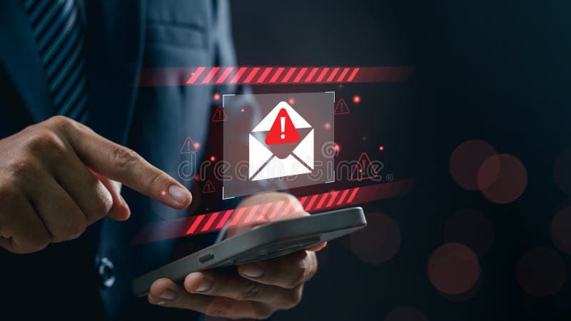 Concept of email warning and phishing scam risk as businessman using smartphone taps on alert message, highlighting cybersecurity stock image