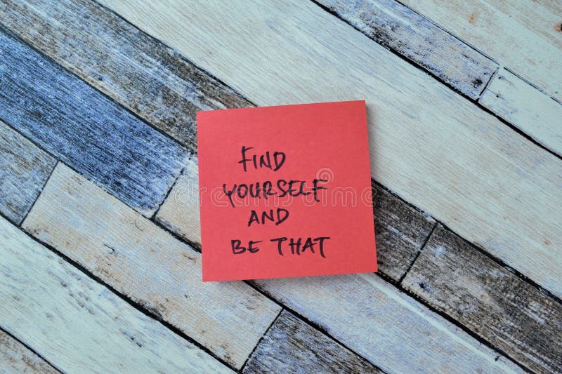 Concept of Find Yourself and Be That write on sticky notes isolated on Wooden Table stock photography