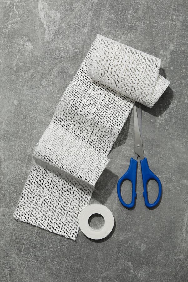 Concept of first aid kit supplies - bandage royalty free stock image