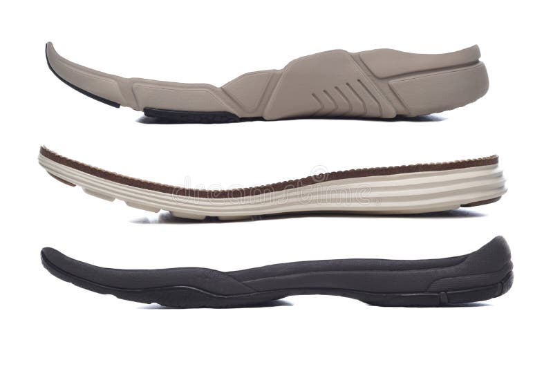 Concept Footware design or replacement parts. Three different Polyurethane rubber shoe soles on a white background royalty free stock photography