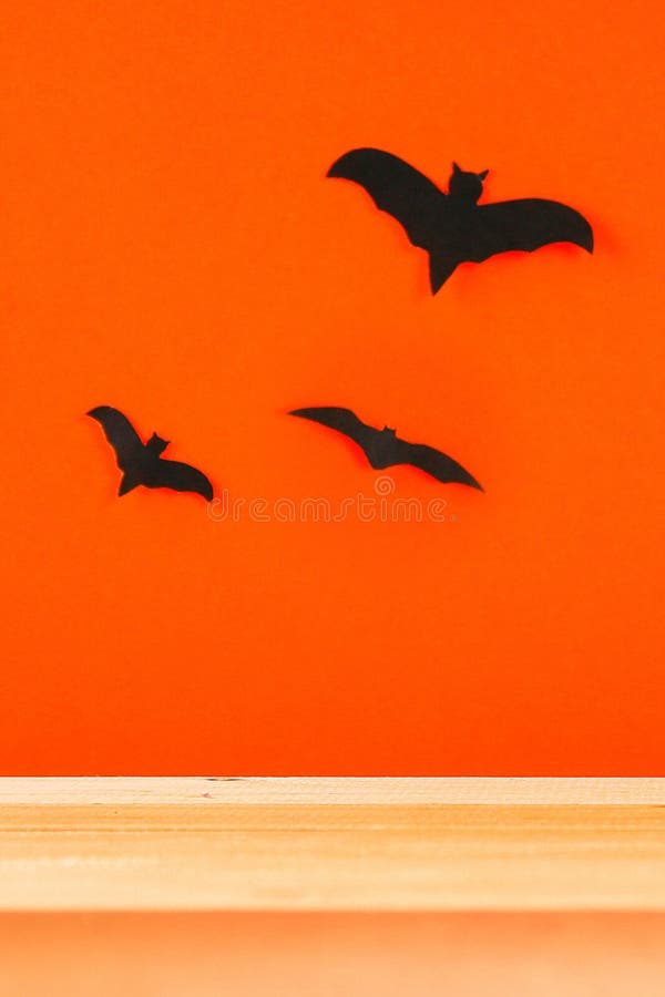 The concept for Halloween. Bats on orange background royalty free stock images The concept for Halloween. Bats on orange background royalty free stock images