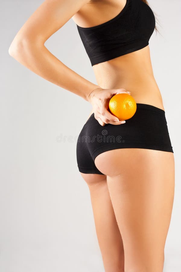 Concept of a healthy body. Beautiful bottom, fruit