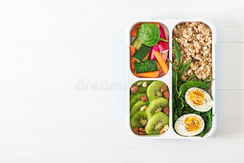 Concept healthy food and sports lifestyle. Vegetarian lunch. Healthy breakfast. Proper nutrition. Lunchbox. Top view. Flat lay royalty free stock photo Concept healthy food and sports lifestyle. Vegetarian lunch. Healthy breakfast. Proper nutrition. Lunchbox. Top view. Flat lay royalty free stock photo