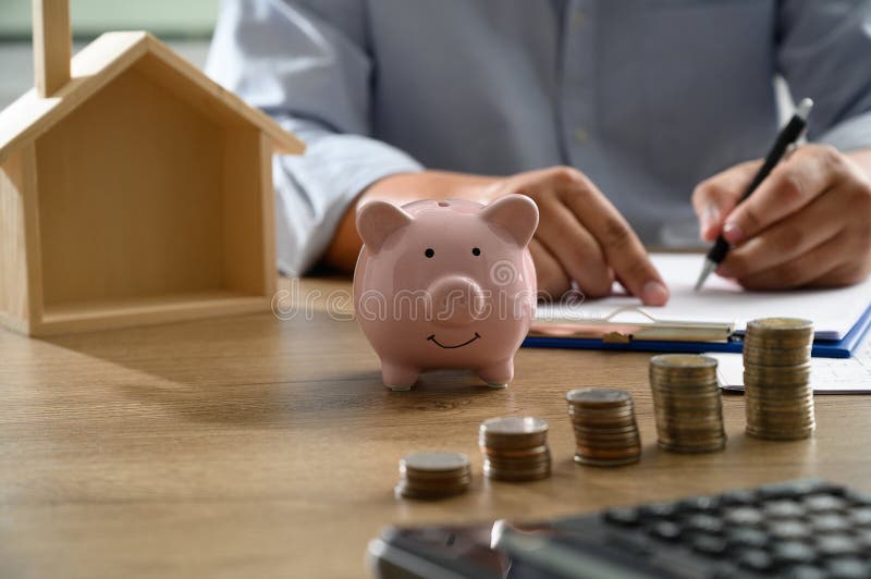 The concept of home ownership Business people negotiating a contract This is where you need to sign royalty free stock photo The concept of home ownership Business people negotiating a contract This is where you need to sign royalty free stock photo
