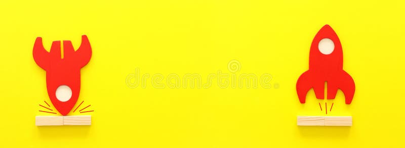 Concept image of crisis and opportunity. one rocket taking off while the second is crashing royalty free stock images