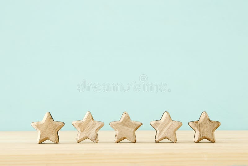 Concept image of setting a five star goal. increase rating or ranking, evaluation and classification idea. stock image Concept image of setting a five star goal. increase rating or ranking, evaluation and classification idea. stock image
