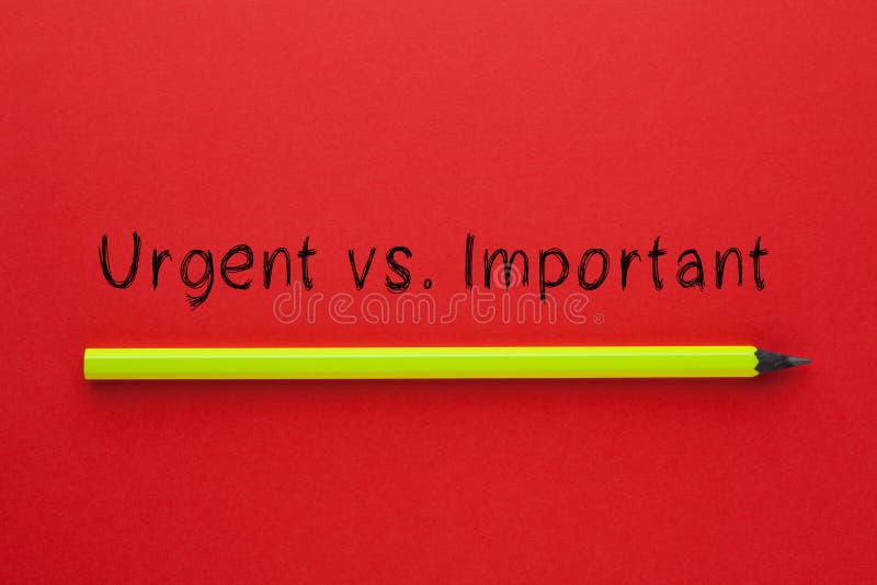 The words urgent vs. important and pencil on red background. Business concept. The words urgent vs. important and pencil on red background. Business concept