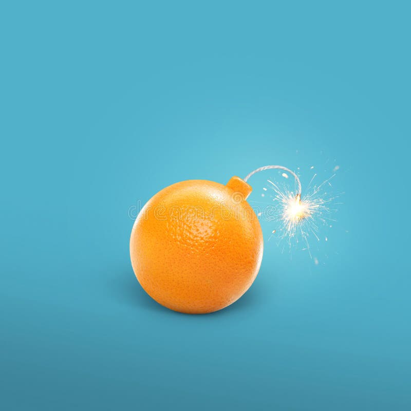 Concept of an orange bomb. Creative bomb with sparks. royalty free stock images Concept of an orange bomb. Creative bomb with sparks. royalty free stock images