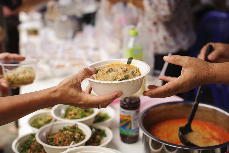 Concept of poverty in Asian society : Charity food is free for people in slums stock photos Concept of poverty in Asian society : Charity food is free for people in slums stock photos