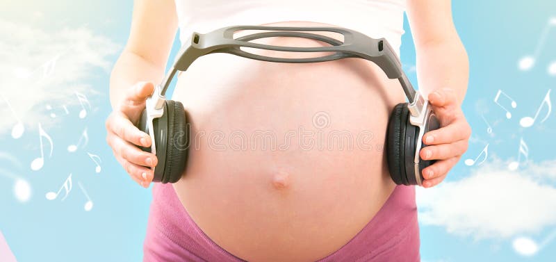 Concept Pregnancy and Music. Belly of Pregnant Woman and Headphones Stock  Image - Image of hand, life: 28234133