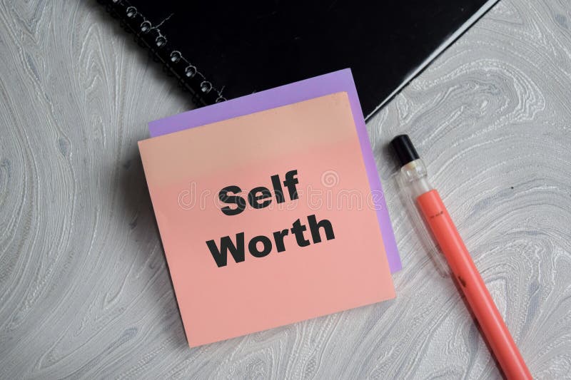 Concept of Self worth write on sticky notes isolated on Wooden Table royalty free stock images