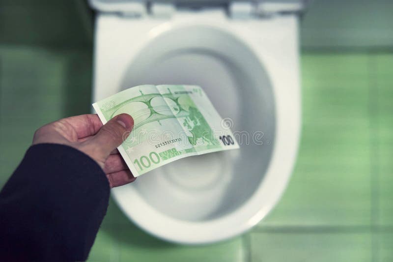 Concept of senseless waste of money, loss, useless waste, large water costs, money and toilet showing financial crisis royalty free stock photography Concept of senseless waste of money, loss, useless waste, large water costs, money and toilet showing financial crisis royalty free stock photography