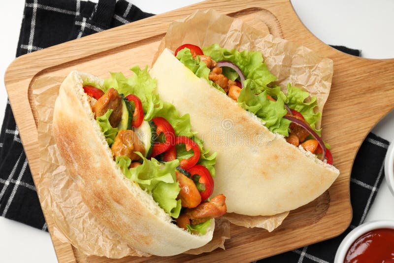 Concept of Tasty Food with Pitas with Chicken Meat Stock Photo Image
