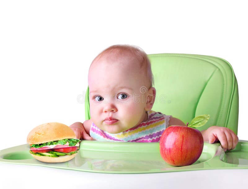 Concept van de kind` s het gezonde voeding Baby die voedsel eet Geïsoleerde royalty-vrije stock foto Concept van de kind` s het gezonde voeding Baby die voedsel eet Geïsoleerde royalty-vrije stock foto