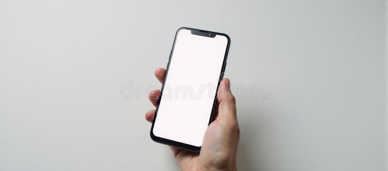 White background features an empty smartphone held by hand against a stark contrast showcasing conceptual design of technology and royalty free illustration