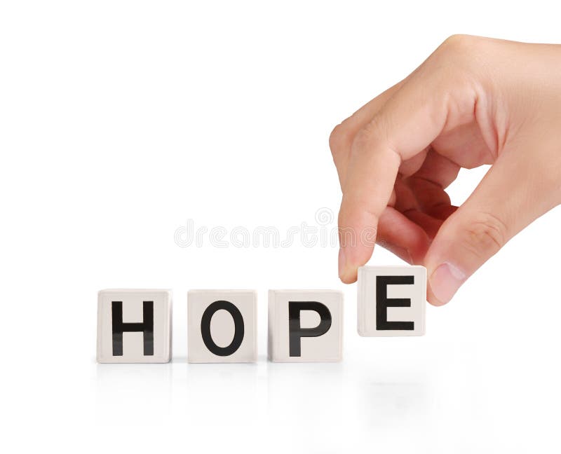 Concept word forming box in hand stock image