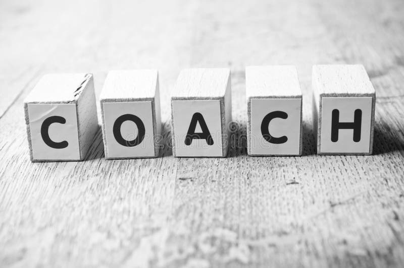 Concept word forming with cube - Coach stock images