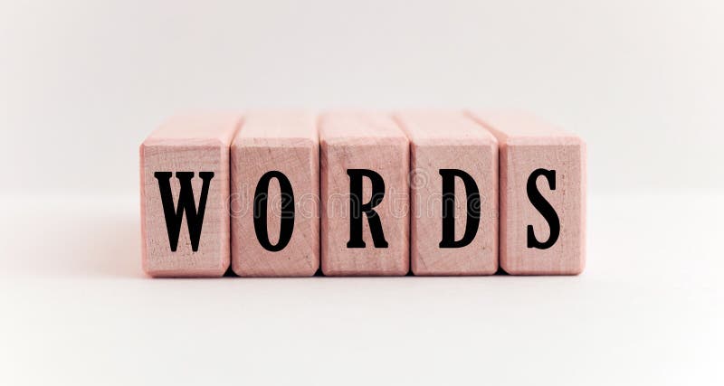 Concept word forming on wooden cube on white background - words stock image