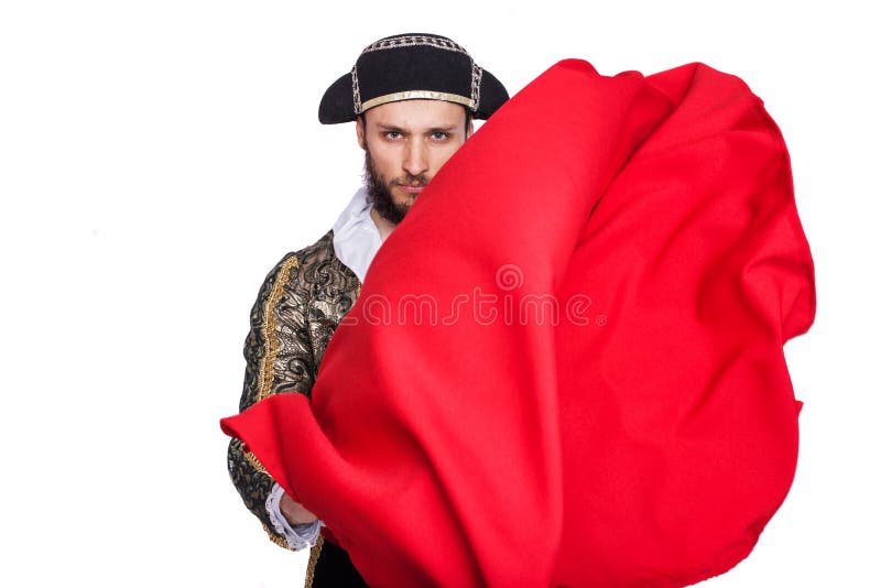 Concept â€žPassionâ€œ. Toreador with a red cape. Isolated on a white background