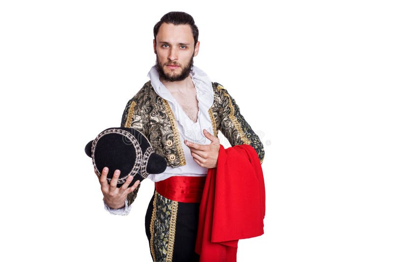 Man dressed as Spanish bull fighter. Isolated on a white background. Man dressed as Spanish bull fighter. Isolated on a white background