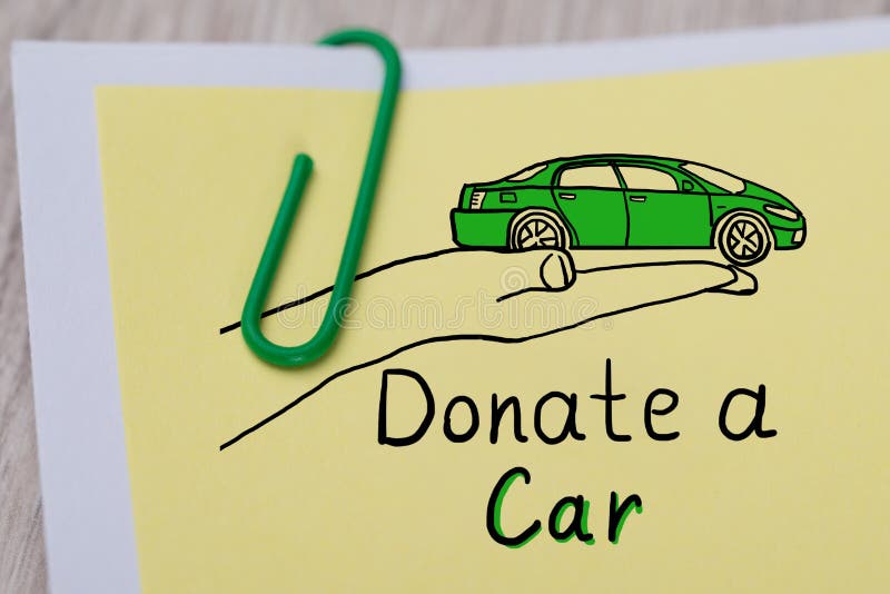 Concepto de donación de autos en papel de apuntes