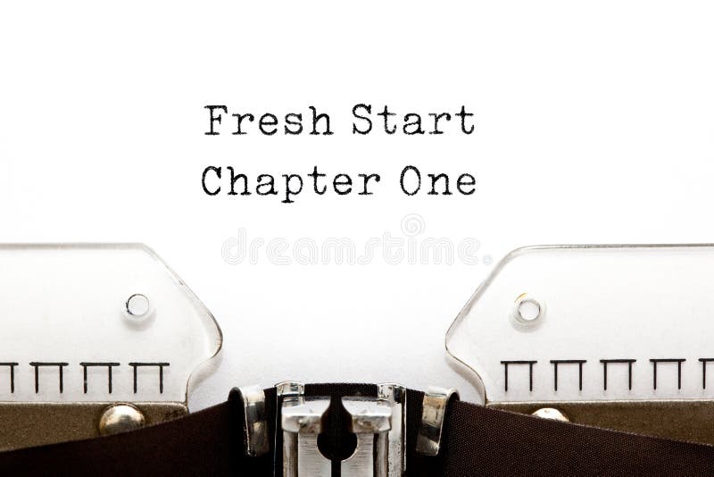 Motivational slogan Fresh Start Chapter One typed on vintage typewriter. Motivational slogan Fresh Start Chapter One typed on vintage typewriter.
