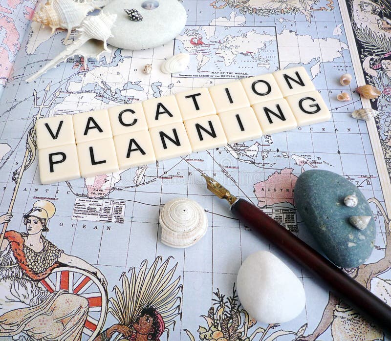 A conceptual photograph of the words vacation planning, placed on an antique world map, and taken with old calligraphy pen, sea shells, pebbles etc. Travel and vacation concept picture. A conceptual photograph of the words vacation planning, placed on an antique world map, and taken with old calligraphy pen, sea shells, pebbles etc. Travel and vacation concept picture.