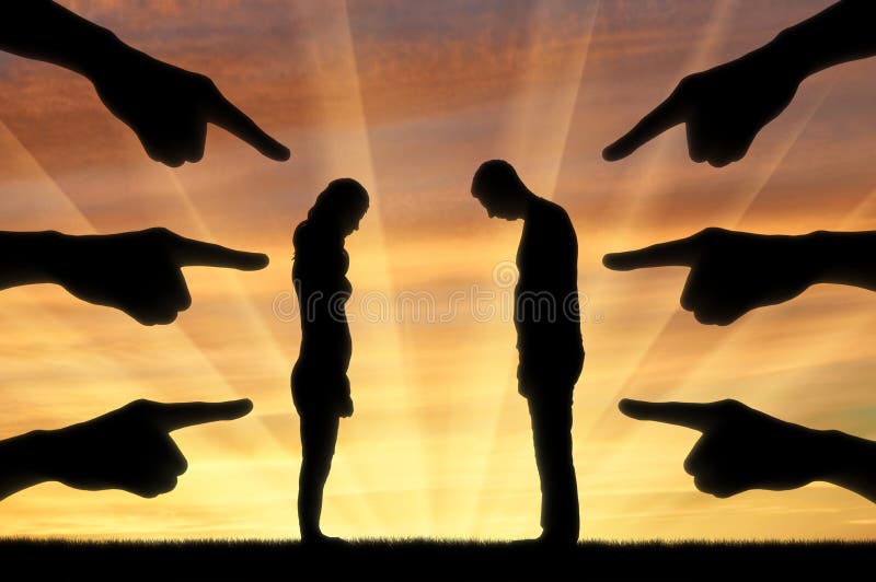 Silhouette, humiliated the man and woman hands pointing a finger at them. The concept of shame and humiliation. Silhouette, humiliated the man and woman hands pointing a finger at them. The concept of shame and humiliation