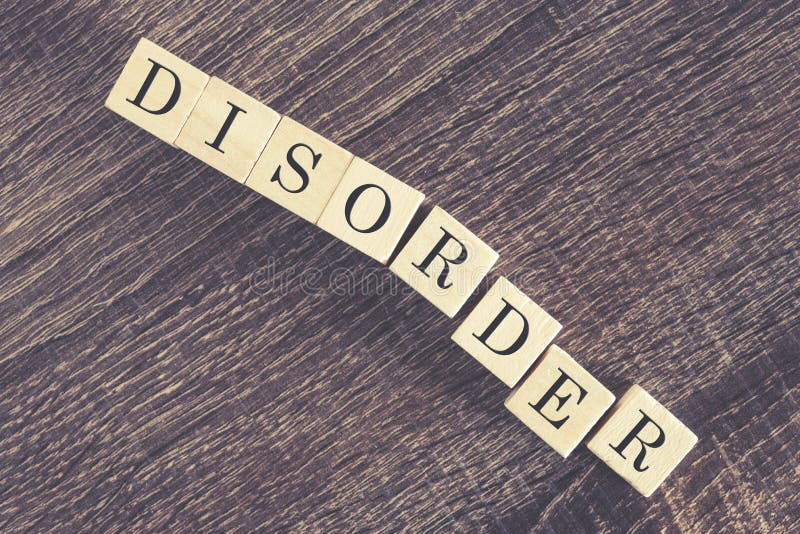 Disorder word formed with wooden blocks. Disorder word formed with wooden blocks