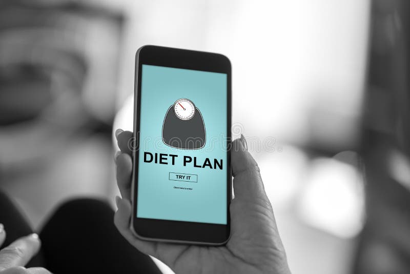 Concepto del plan de la dieta en un smartphone imagenes de archivo Concepto del plan de la dieta en un smartphone imagenes de archivo