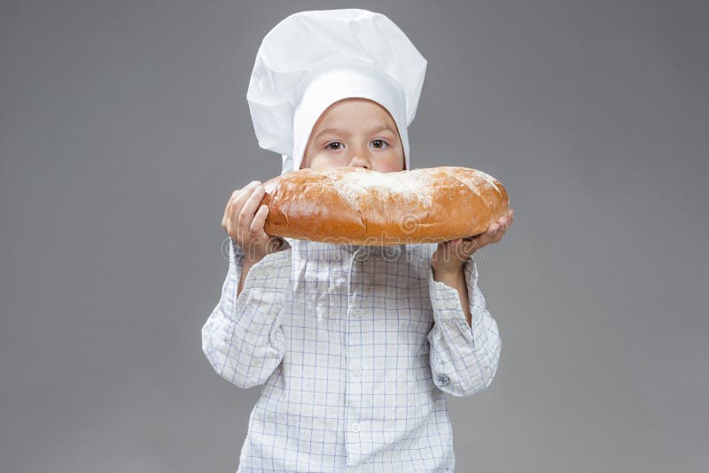 Concepts de nourriture Portrait de Caucasien heureux Little Boy images stock Concepts de nourriture Portrait de Caucasien heureux Little Boy images stock