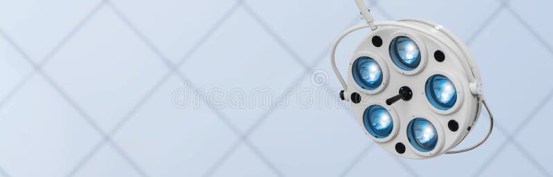 Conceptual banner with operating lamp. Operating lamp against a blurred operating room background. Flat lay copy space royalty free stock photo